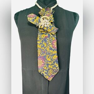 Elegant Blue Necktie with Gold/Burgundy Design featuring Gold Brooch